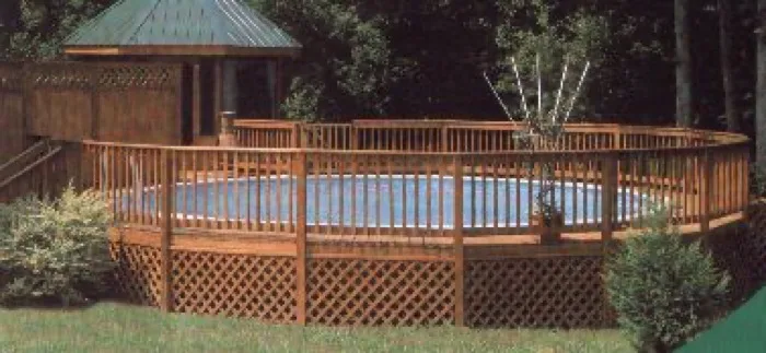 Round above-ground pool installed by Coastal Pools